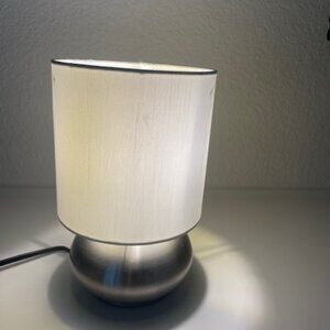 A mini touch table lamp